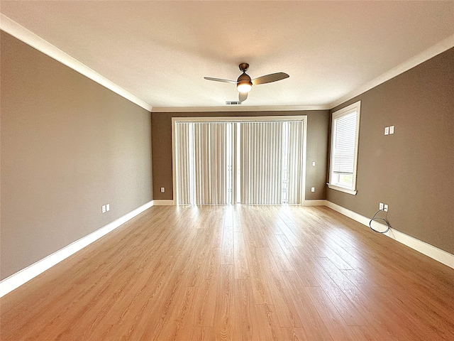 3517 Windhaven Pkwy Unit 1209, Lewisville, TX 75056 - unfurnished room featuring ceiling fan, crown molding, and light wood-type flooring