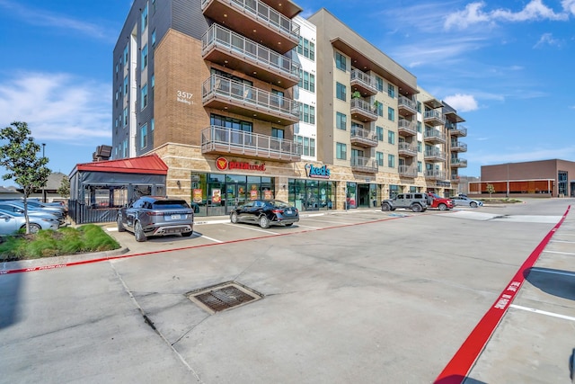 3517 Windhaven Pkwy Unit 1209, Lewisville, TX 75056 - view of apartment building / complex featuring uncovered parking