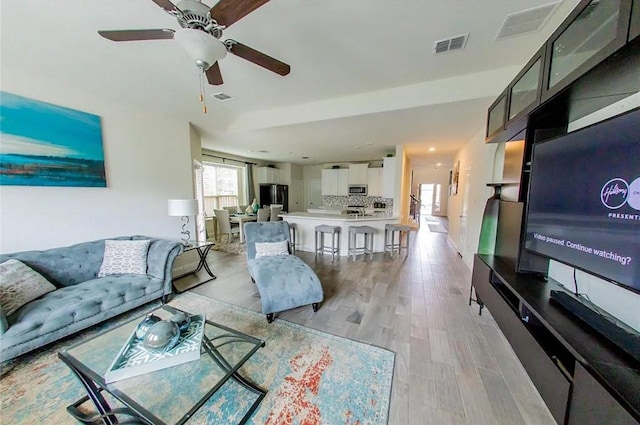 1844 Rio Costilla Rd, Fort Worth, TX 76131 - living area featuring light wood-style floors and ceiling fan