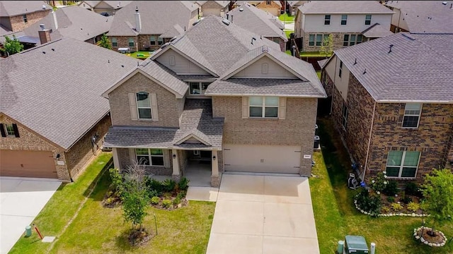 1844 Rio Costilla Rd, Fort Worth, TX 76131 - view of front of house featuring driveway, a residential view, and brick siding