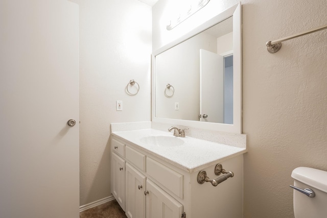 5903 Cameron Dr, Arlington, TX 76017 - half bathroom with vanity and toilet