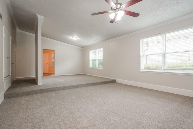 5903 Cameron Dr, Arlington, TX 76017 - unfurnished room with a textured ceiling, light colored carpet, crown molding, vaulted ceiling, and ceiling fan