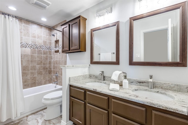 8600 Digby Dr, Plano, TX 75025 - bathroom with double vanity, shower / bathtub combination with curtain, recessed lighting, and marble finish floors