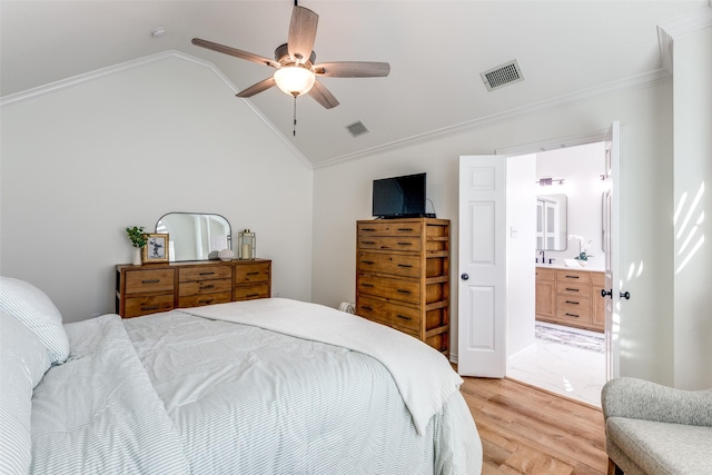 8600 Digby Dr, Plano, TX 75025 - bedroom featuring lofted ceiling, light wood-style flooring, crown molding, a ceiling fan, and connected bathroom