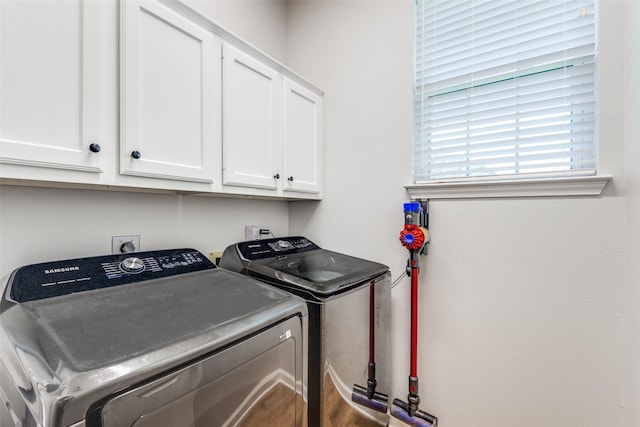 8600 Digby Dr, Plano, TX 75025 - washroom featuring washer and clothes dryer and cabinet space