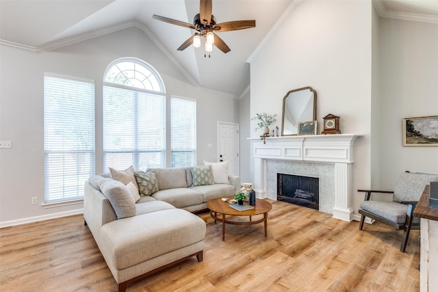 8600 Digby Dr, Plano, TX 75025 - living room with ceiling fan, wood finished floors, a fireplace, and high vaulted ceiling