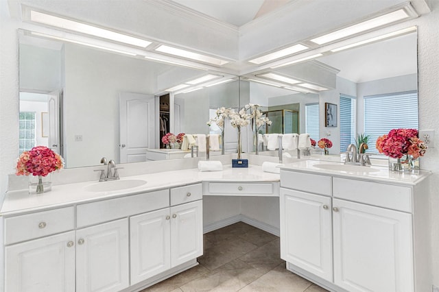 2904 Champlin Ct, Richardson, TX 75082 - full bathroom with double vanity, tile patterned floors, a walk in closet, vaulted ceiling, and healthy amount of natural light