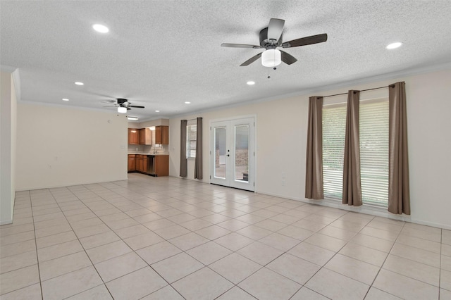 1509 Jefferson St, Bowie, TX 76230 - unfurnished living room with ceiling fan, a textured ceiling, recessed lighting, plenty of natural light, and ornamental molding