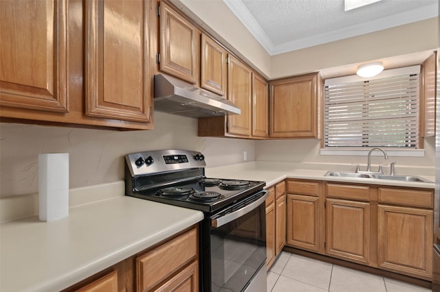 1509 Jefferson St, Bowie, TX 76230 - kitchen featuring stainless steel range with electric stovetop, under cabinet range hood, light countertops, a textured ceiling, and crown molding