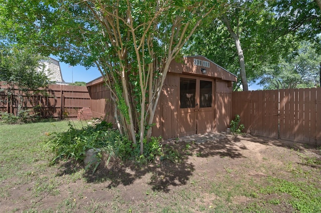 1509 Jefferson St, Bowie, TX 76230 - fenced backyard with an outbuilding