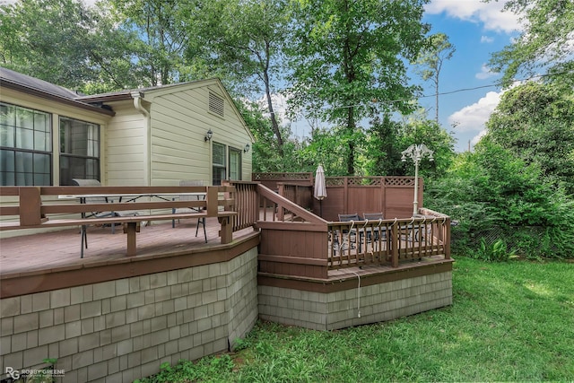 3933 Baltimore Ave, Shreveport, LA 71106 - wooden deck featuring outdoor dining space and a yard