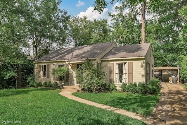 3933 Baltimore Ave, Shreveport, LA 71106 - view of front of home with a front yard and a shingled roof