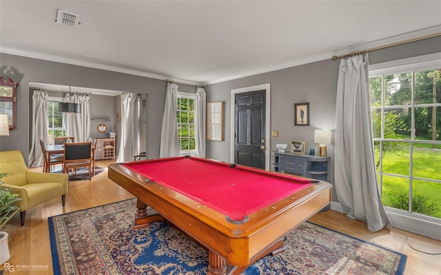 3933 Baltimore Ave, Shreveport, LA 71106 - game room with plenty of natural light, wood finished floors, ornamental molding, and billiards table