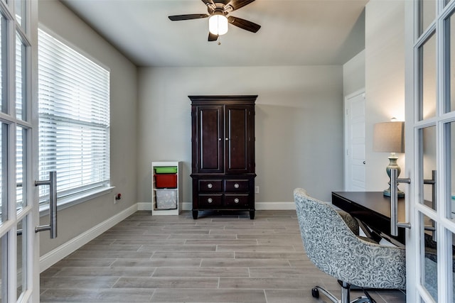 11825 Wulstone Rd, Fort Worth, TX 76052 - home office featuring french doors, a ceiling fan, and light wood-style floors