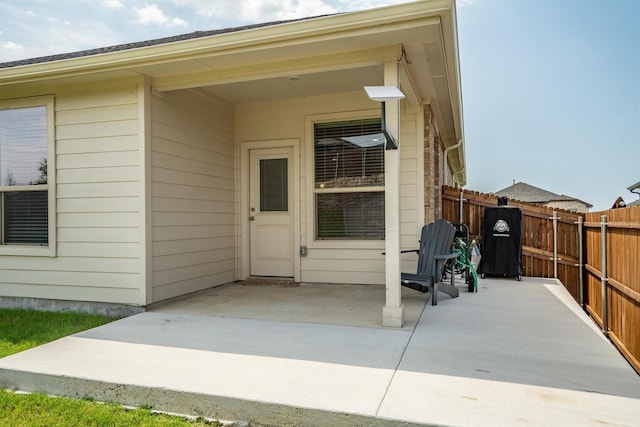 171 Tanager Dr, Rhome, TX 76078 - view of exterior entry featuring a patio
