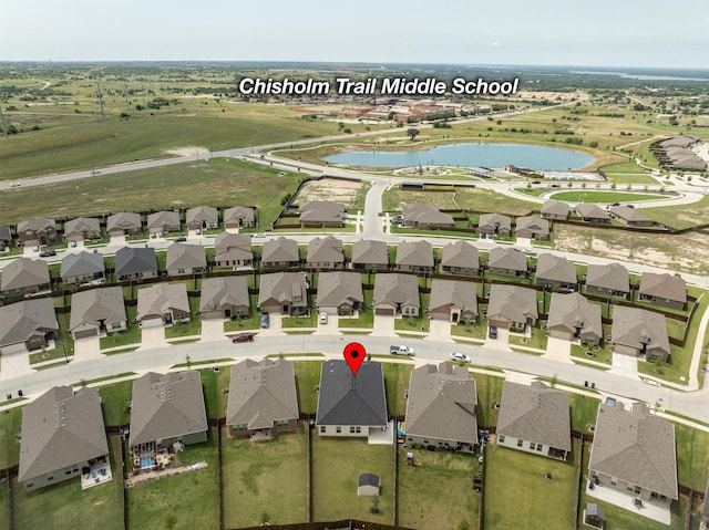 171 Tanager Dr, Rhome, TX 76078 - aerial overview of property's location featuring a nearby body of water and nearby suburban area