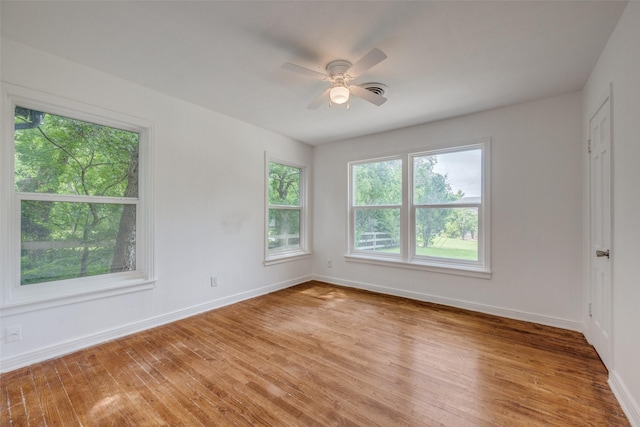 917 W Washington St, Sherman, TX 75092 - spare room featuring light wood-style floors and a ceiling fan