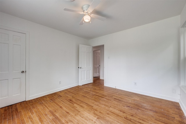 917 W Washington St, Sherman, TX 75092 - unfurnished room featuring light wood-style floors and ceiling fan