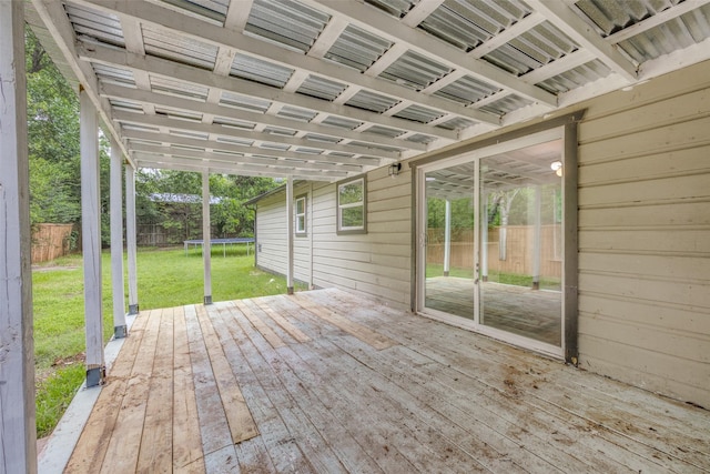 917 W Washington St, Sherman, TX 75092 - wooden deck featuring a trampoline