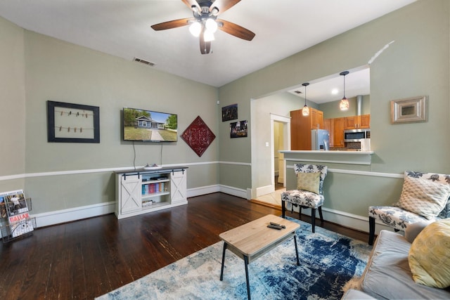 5502 Victor, Dallas, TX 75214 - living area featuring wood finished floors and ceiling fan
