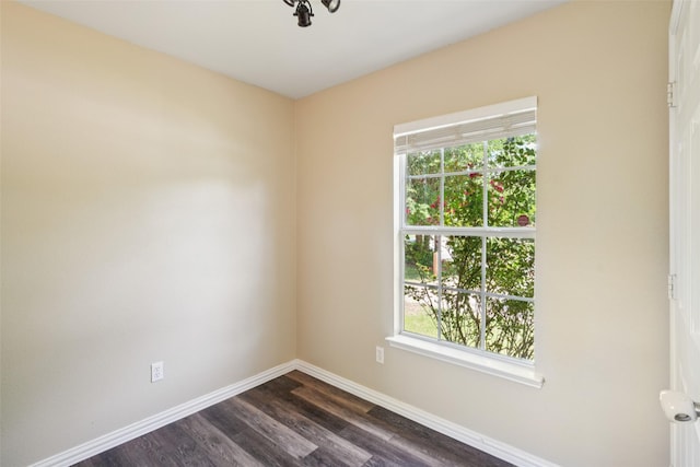 312 Robertson St, Denton, TX 76205 - empty room with plenty of natural light and dark wood-style flooring