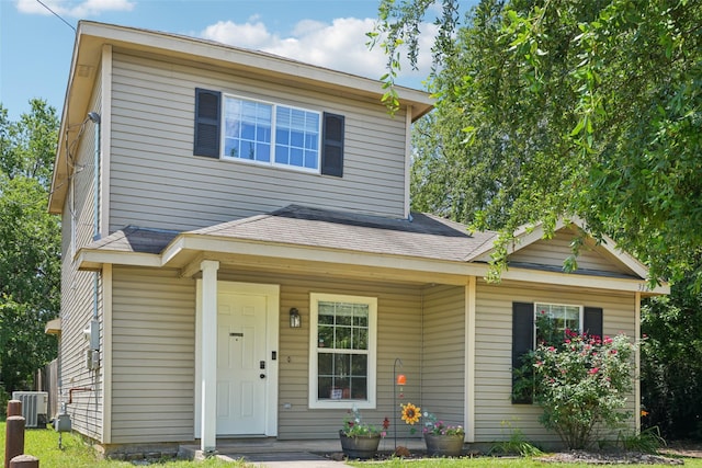 312 Robertson St, Denton, TX 76205 - view of front of home with roof with shingles and a porch