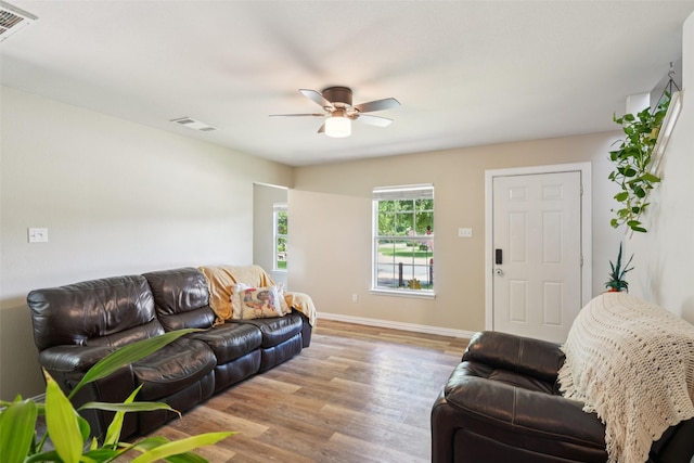 312 Robertson St, Denton, TX 76205 - living room featuring ceiling fan and light wood-style flooring