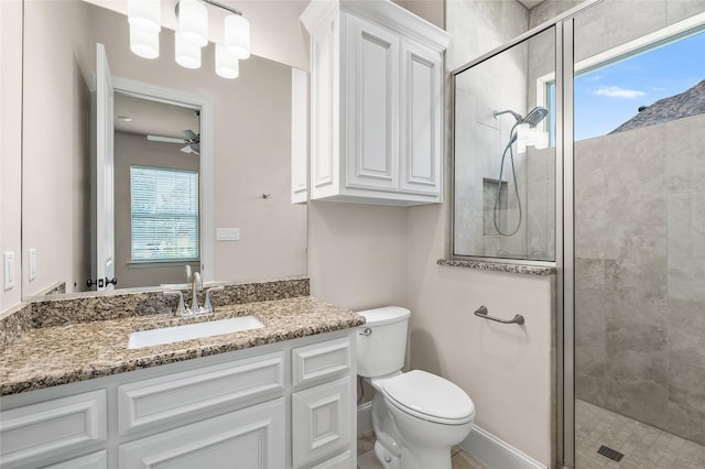2604 Silverado Trl, Sherman, TX 75092 - bathroom featuring a stall shower, vanity, and ceiling fan