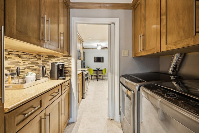 11330 Park Central Pl Unit C, Dallas, TX 75230 - laundry room with a ceiling fan and washer and dryer
