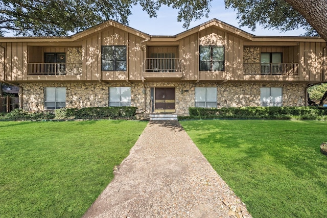 11330 Park Central Pl Unit C, Dallas, TX 75230 - view of front of home with stone siding and a balcony