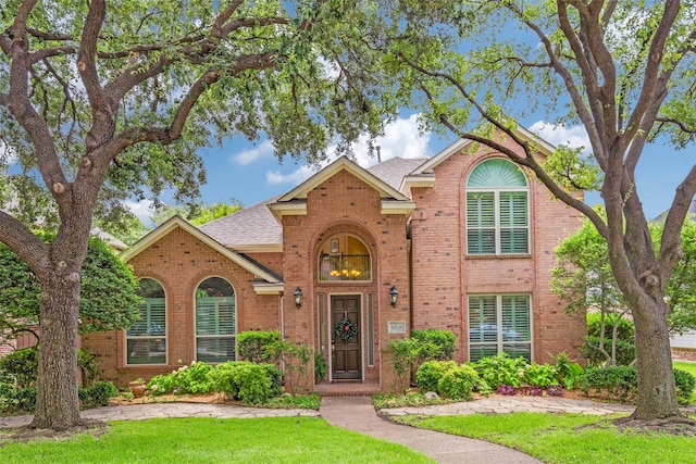 6328 Birchmont Dr, Plano, TX 75093 - traditional-style home with brick siding, a shingled roof, and a front lawn