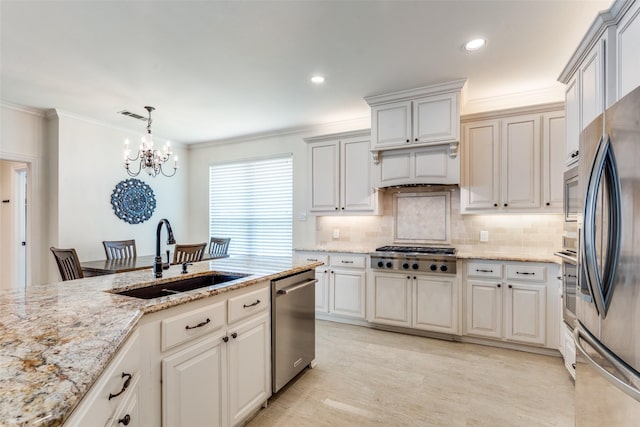 6328 Birchmont Dr, Plano, TX 75093 - kitchen featuring stainless steel appliances, a chandelier, light stone countertops, ornamental molding, and recessed lighting