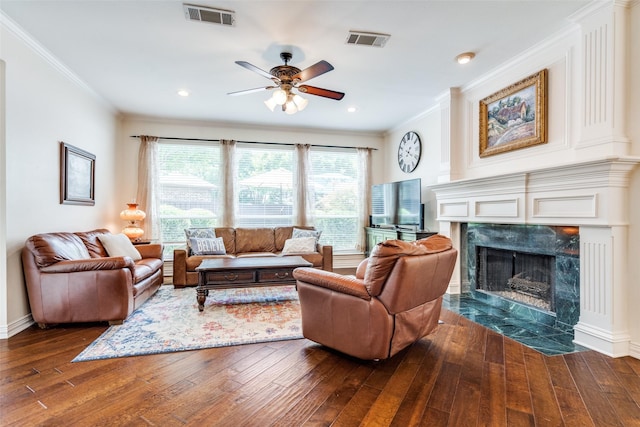 6328 Birchmont Dr, Plano, TX 75093 - living room featuring crown molding, hardwood / wood-style flooring, a premium fireplace, ceiling fan, and recessed lighting