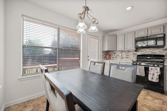 5603 Farris Dr, Arlington, TX 76017 - dining room featuring a chandelier and baseboards