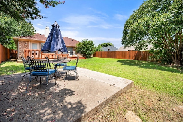 5603 Farris Dr, Arlington, TX 76017 - fenced backyard featuring a patio area and outdoor dining space
