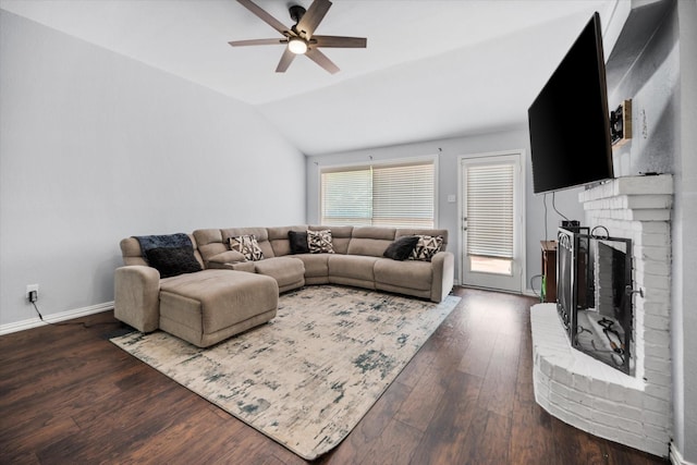 5603 Farris Dr, Arlington, TX 76017 - living area featuring a fireplace, a ceiling fan, vaulted ceiling, and dark wood-style floors