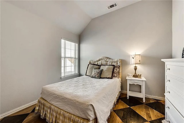 946 Briar Oaks Dr, Rockwall, TX 75087 - bedroom with vaulted ceiling and dark wood-style floors