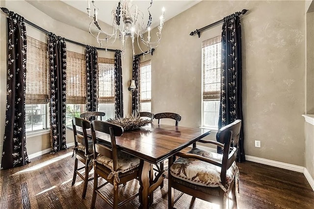 946 Briar Oaks Dr, Rockwall, TX 75087 - dining area with wood finished floors and a chandelier