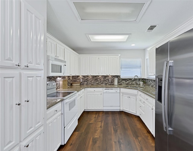3937 Marsh Ln, Fort Worth, TX 76123 - kitchen with white appliances, dark wood-style flooring, dark stone countertops, and white cabinets