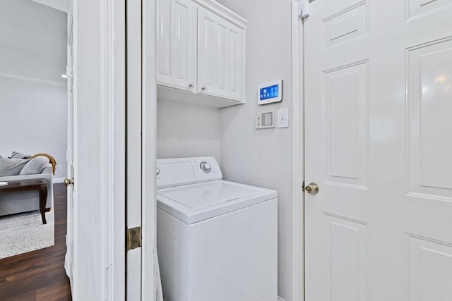 3937 Marsh Ln, Fort Worth, TX 76123 - washroom with washer / clothes dryer, dark wood-style flooring, and cabinet space