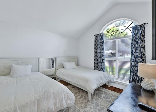 3937 Marsh Ln, Fort Worth, TX 76123 - bedroom with vaulted ceiling and wood finished floors