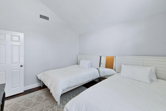 3937 Marsh Ln, Fort Worth, TX 76123 - bedroom featuring wood finished floors and high vaulted ceiling