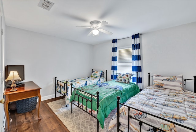 3937 Marsh Ln, Fort Worth, TX 76123 - bedroom with wood finished floors and ceiling fan