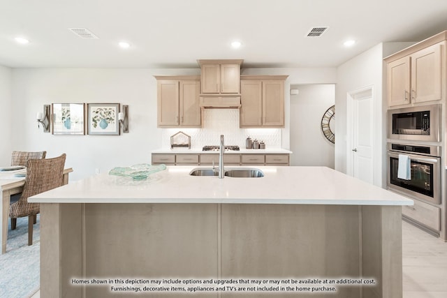 443 Aspen Way, Lavon, TX 75166 - kitchen with appliances with stainless steel finishes, light brown cabinets, light countertops, tasteful backsplash, and recessed lighting