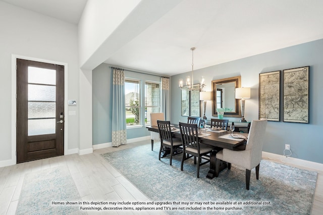 443 Aspen Way, Lavon, TX 75166 - dining space with a chandelier and wood finished floors