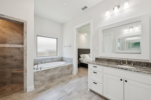 2751 Langley Way, Prosper, TX 75078 - bathroom featuring a garden tub, vanity, connected bathroom, and a tile shower