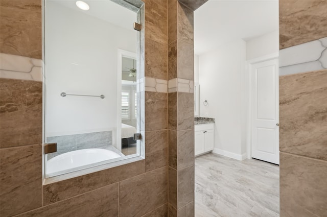 2751 Langley Way, Prosper, TX 75078 - ensuite bathroom with vanity and tiled tub