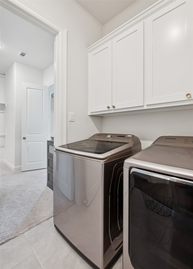 2751 Langley Way, Prosper, TX 75078 - laundry area with washer and clothes dryer, cabinet space, and light carpet