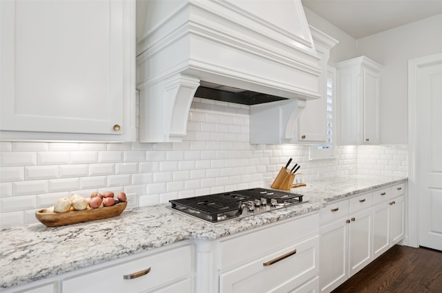 2751 Langley Way, Prosper, TX 75078 - kitchen featuring stainless steel gas cooktop, white cabinetry, tasteful backsplash, and dark wood finished floors