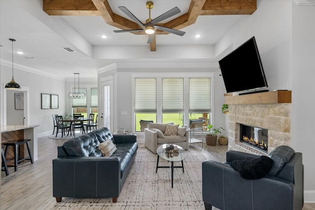 12457 Maplewood Dr, Lindale, TX 75771 - living room with a ceiling fan, light wood-style floors, a stone fireplace, recessed lighting, and coffered ceiling
